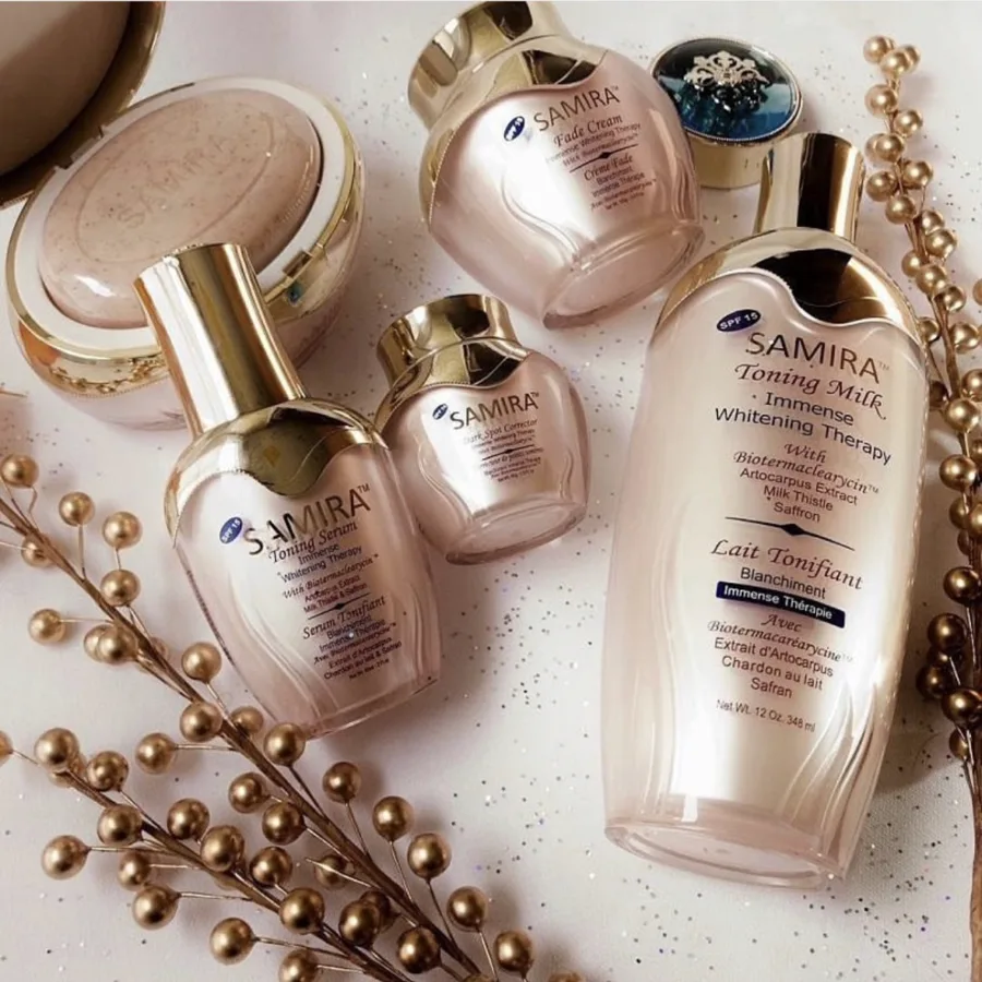 Samira range laid out with toning milk, toning serum, creams and soap among gold decorations